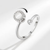 Elegant simple ring for women featuring a central gemstone and sparkling accents