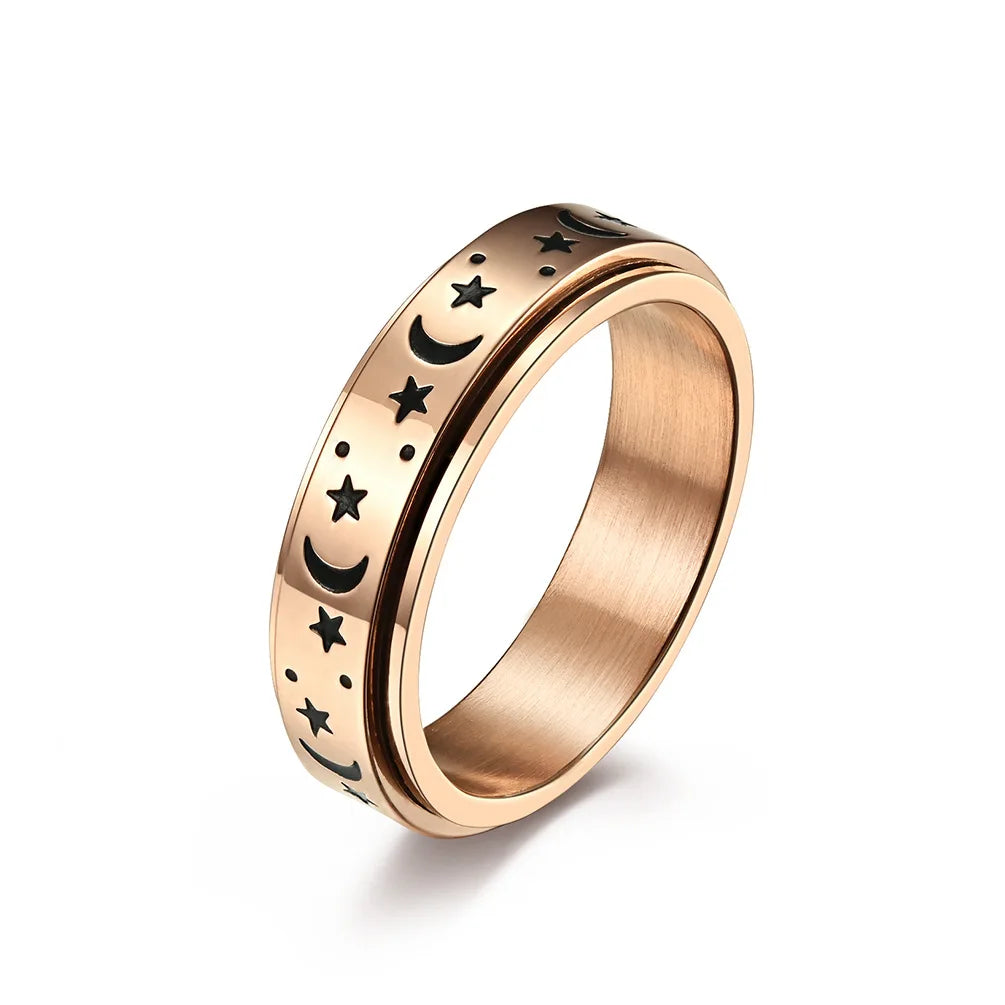 stainless steel star spinner ring featuring a sleek design with star and moon engravings