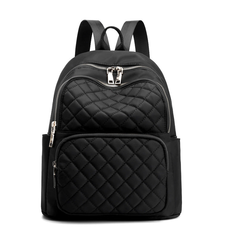 black quilted stylish everyday women's backpack with multiple zippered compartments