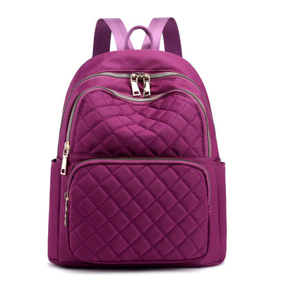 quilted purple stylish everyday women's backpack with multiple zippered compartments