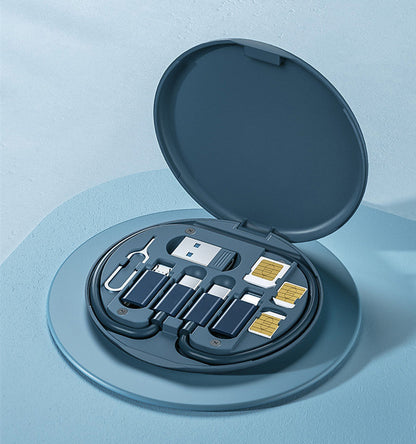 digital travel charging cable storage solution with multiple adapters and SIM card holders in a round case