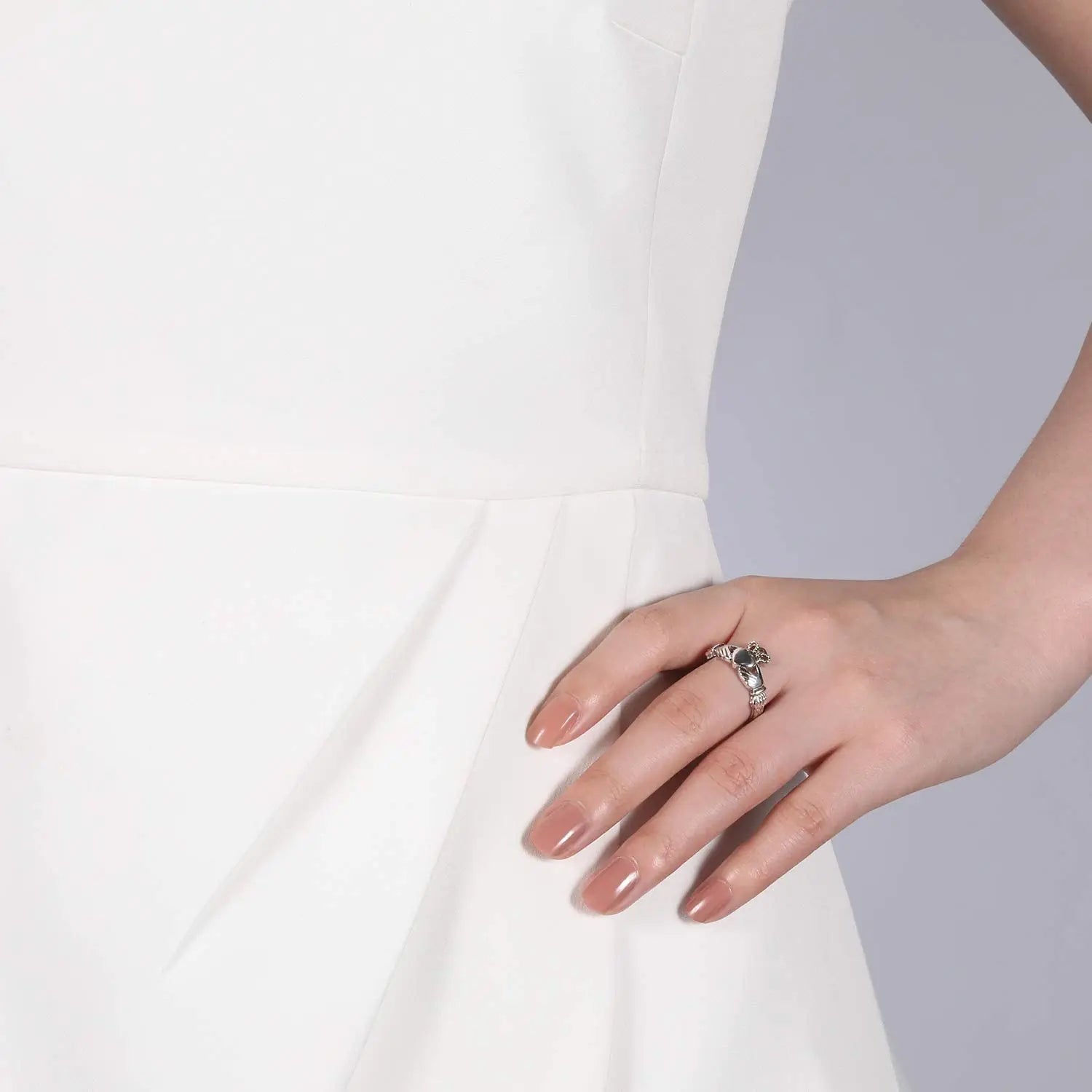 Elegant 925 sterling silver Irish promise ring for women, showcased on a model's hand against a soft background