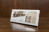 mechanical locomotive model kit box featuring intricate wood pieces for assembly and detailed design