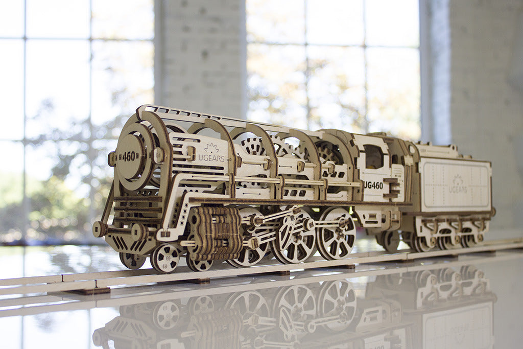 UGears mechanical locomotive model kit with intricate details and wooden craftsmanship on display