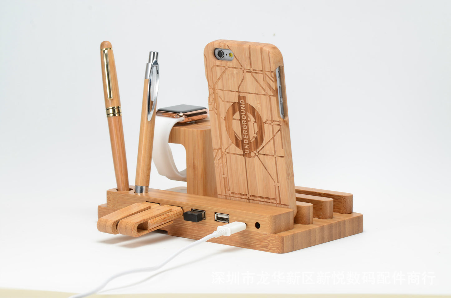 CJD iPhone case on a stylish universal wood charging station with pen and smartwatch holder