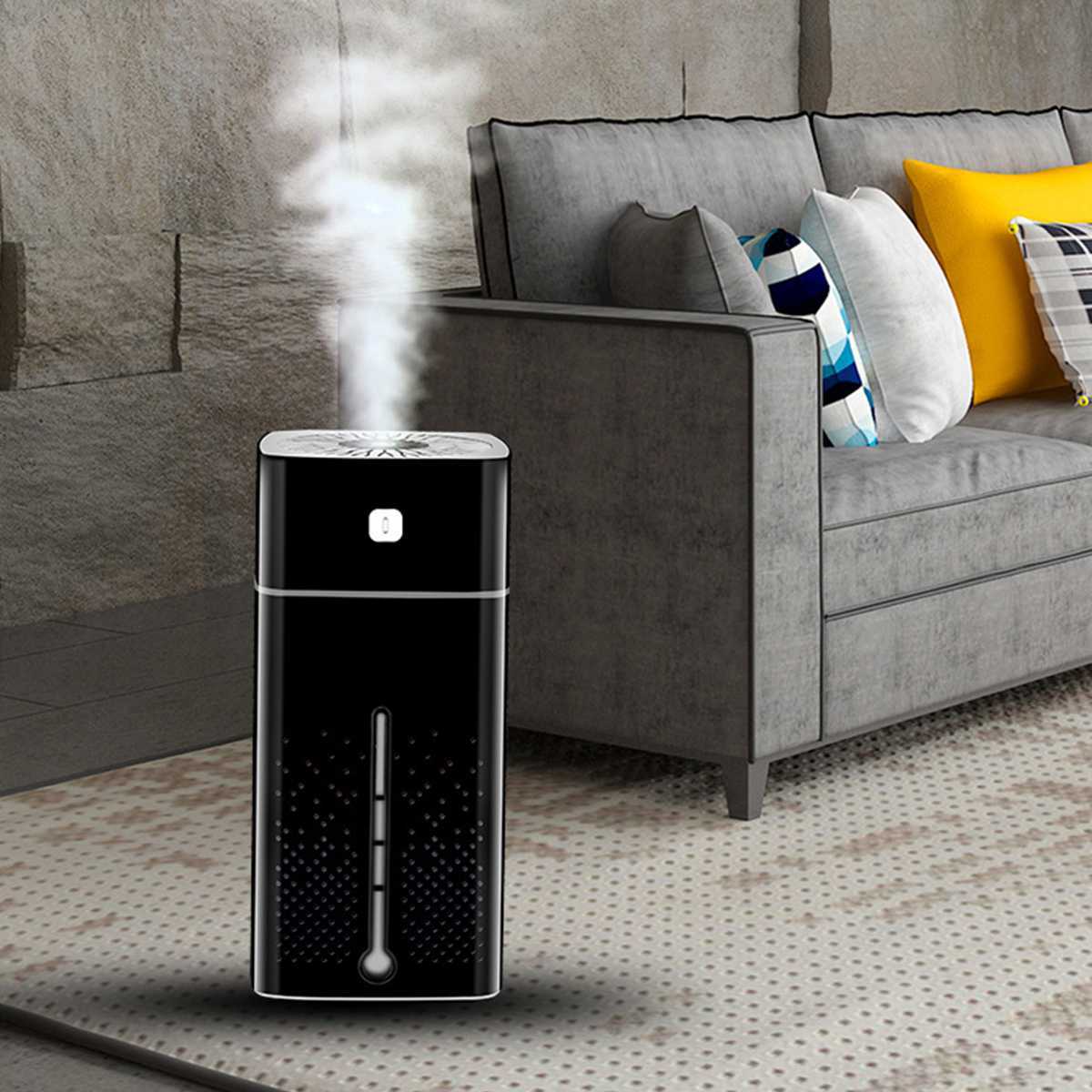 USB air purifier humidifier releasing steam in a cozy living room setting with modern furniture