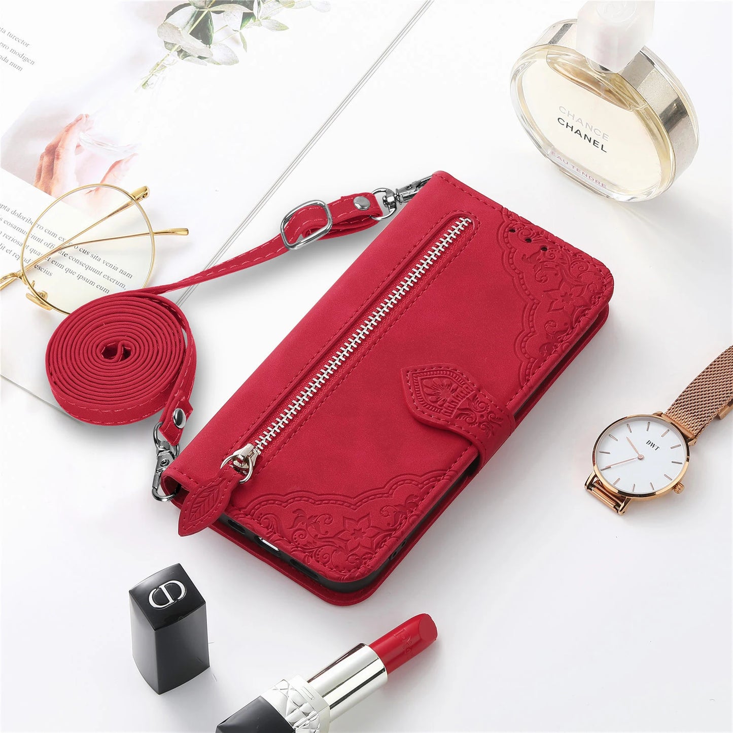 Red wallet case for iPhone 14 13 12 with strap featuring intricate design and zip closure